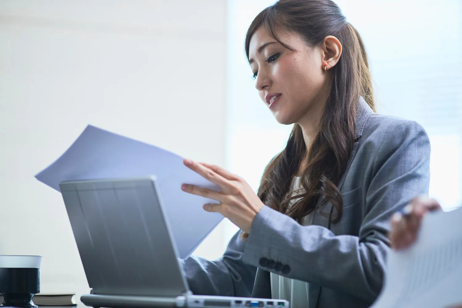 Hiring manager with paperwork.