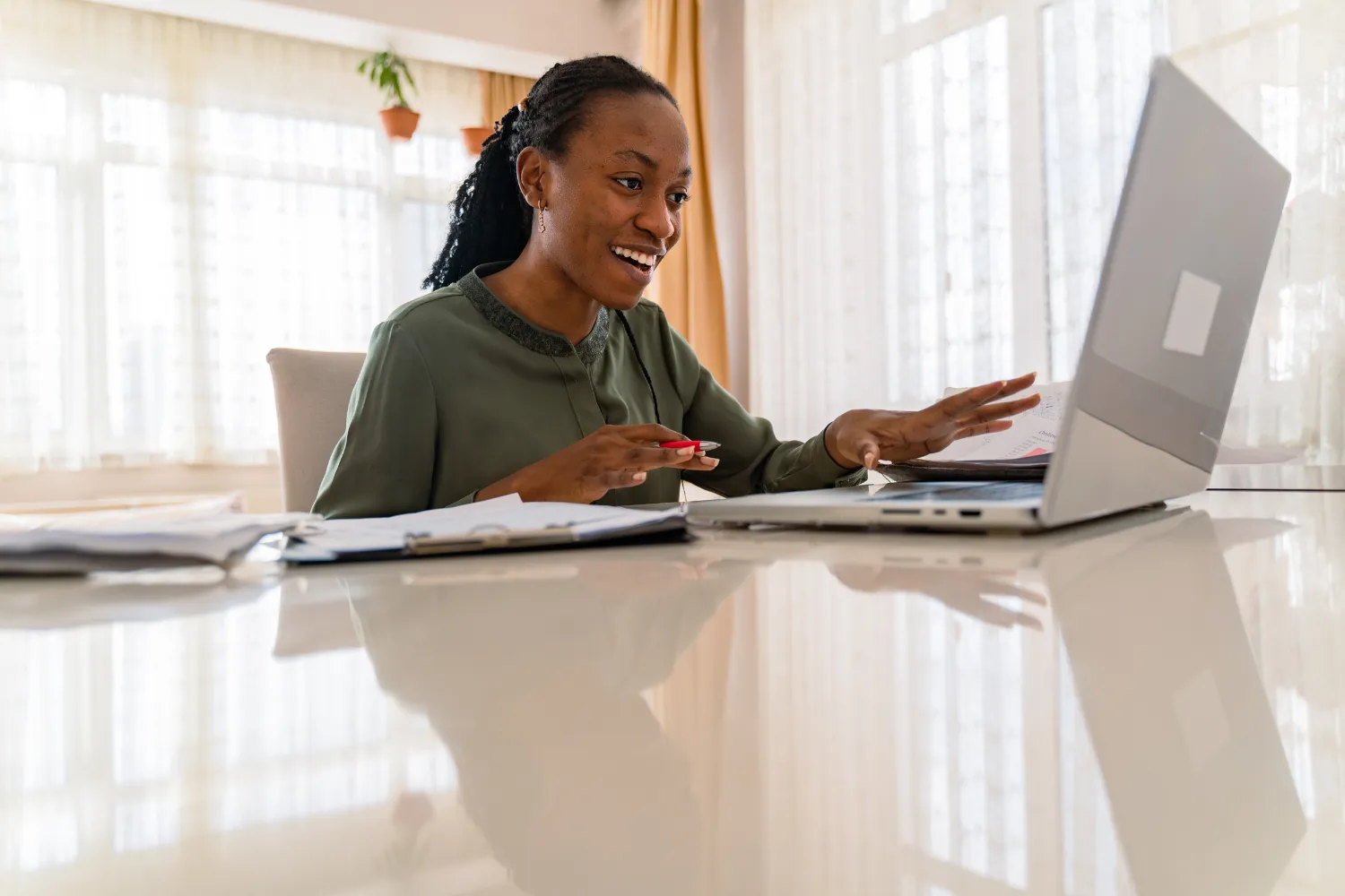 An overseas remote worker working on her laptop.
