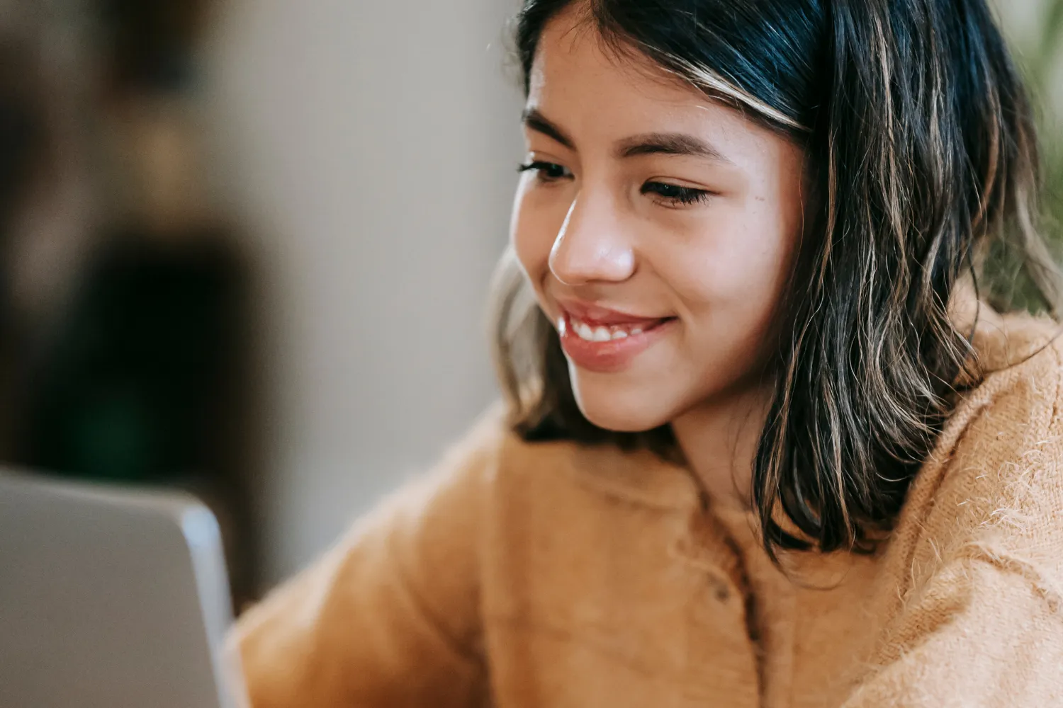 Smiling remote worker on an interview.