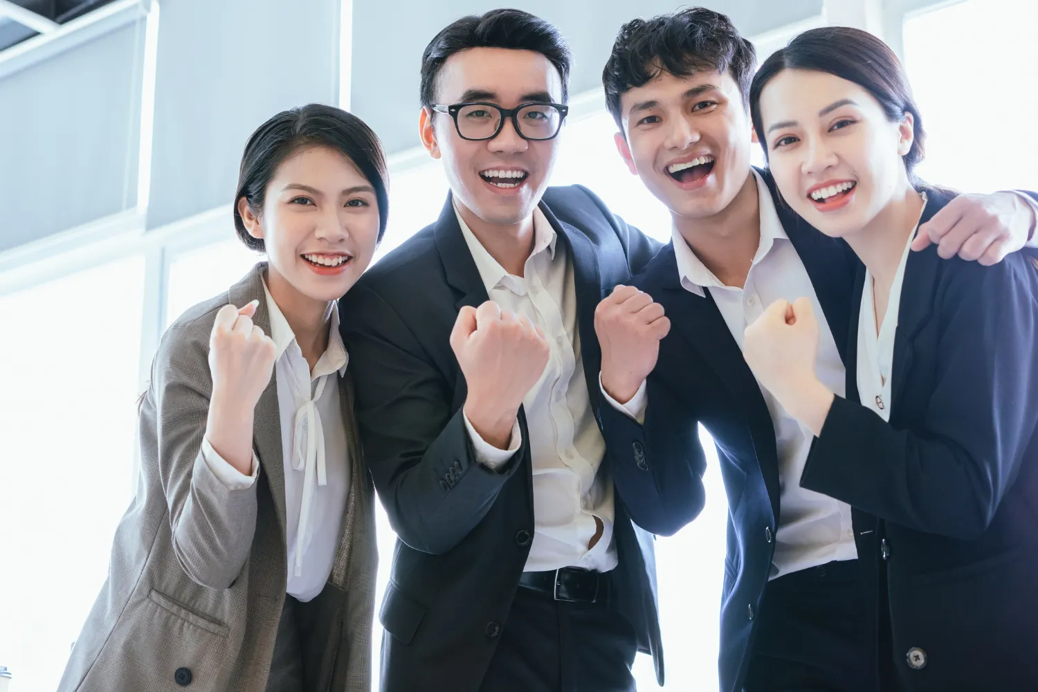 A group of Filipinos looking excited and happy.