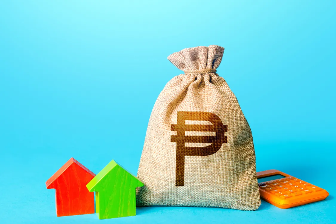 Money bag with Philippine peso sign, colorful house icons, and calculator representing home development mutual fund and employee savings