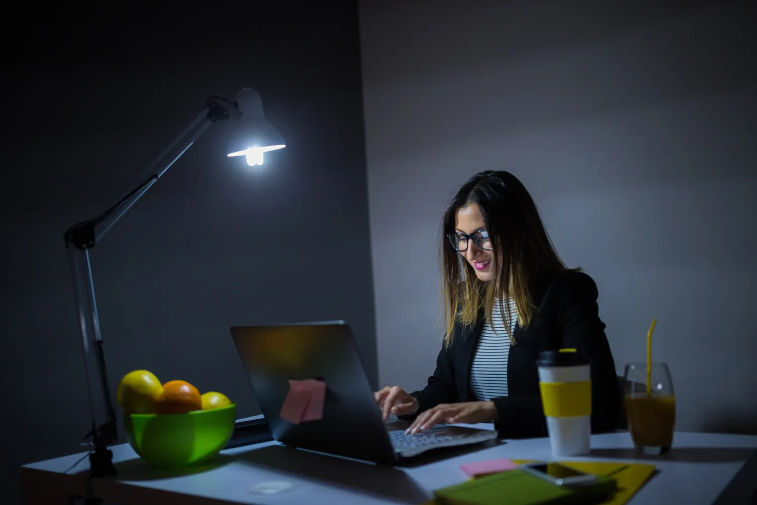 Remote employee working at night.