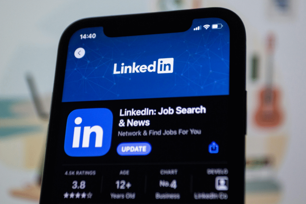 LinkedIn Job Search and News mobile app open on a phone, used for finding Filipino professionals online.