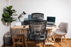 A home office with a proper desk, ergonomic chair, bright lighting, and minimal background noise.