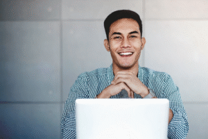 Confident Filipino male candidate preparing for final interview online
