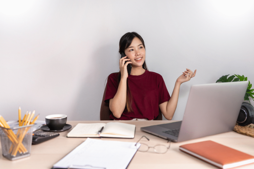 Filipino remote employee on a call clarifying role expectations while working from home.