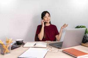 Filipino remote employee on a call clarifying role expectations while working from home.