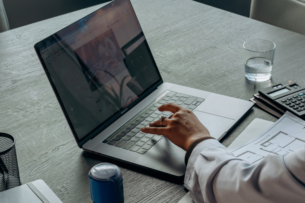 Person working on laptop.