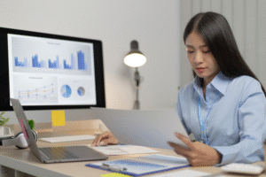 Employee reading through documents while working at home.