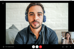Man and woman on a meeting via video call.