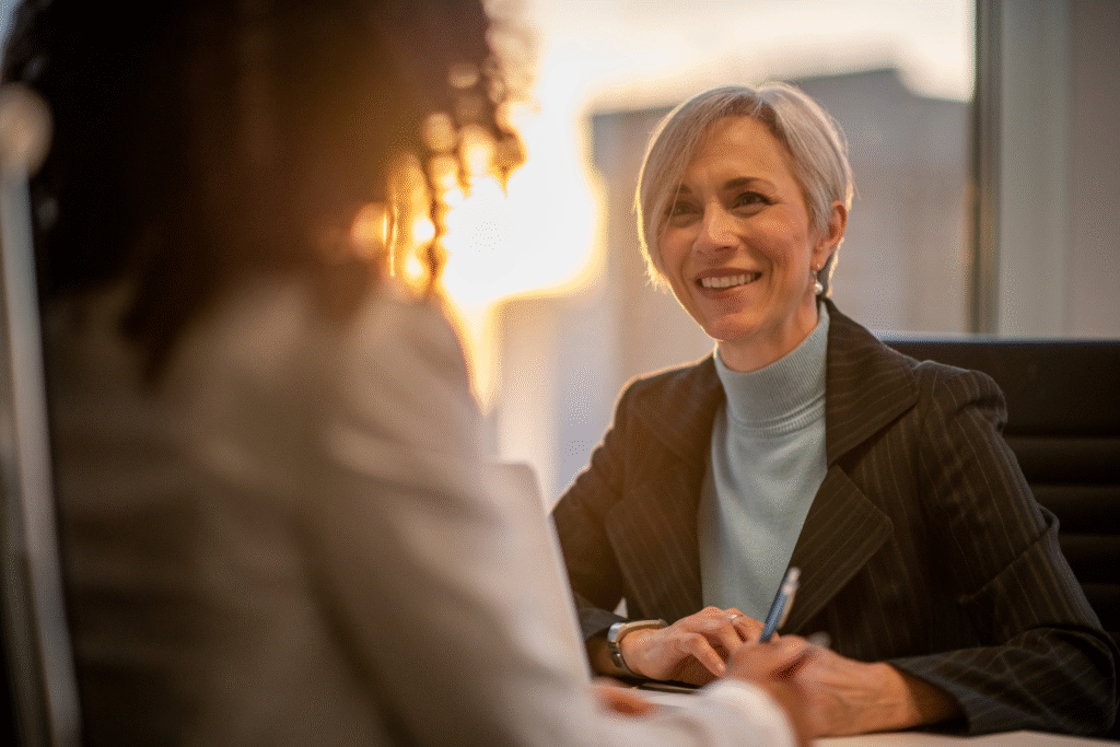 Manager and employee talking.