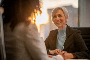Manager and employee talking.