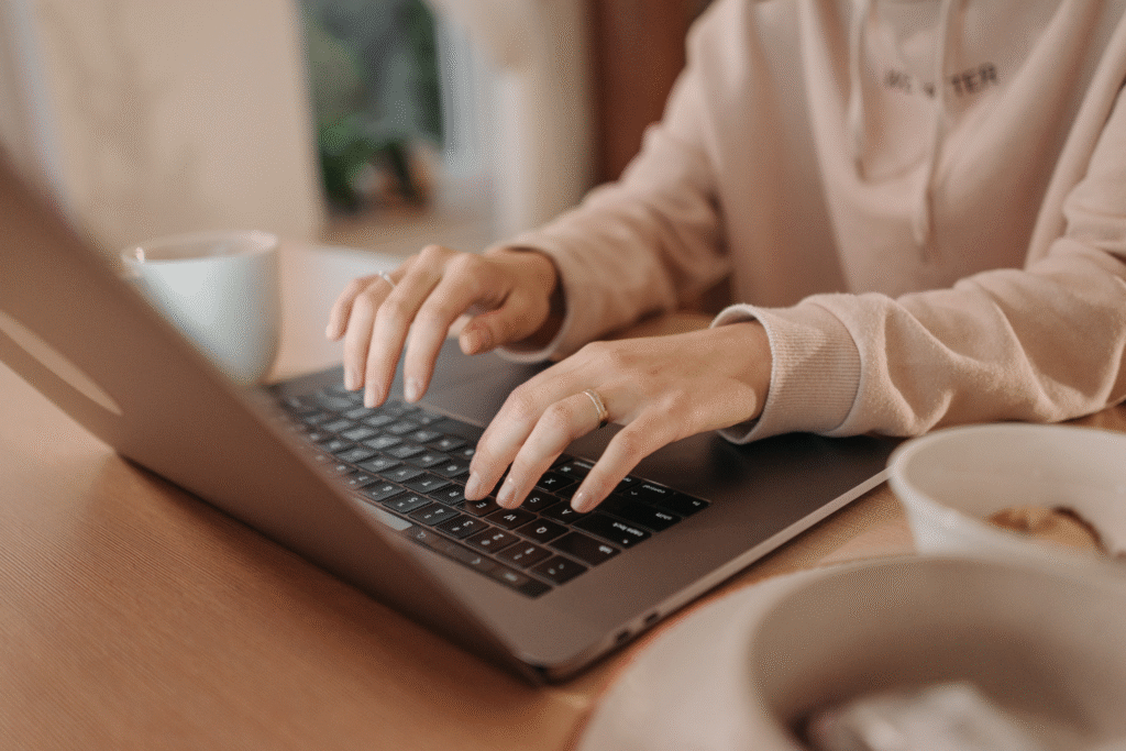 Woman chatting on laptop.