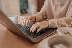 Woman chatting on laptop.